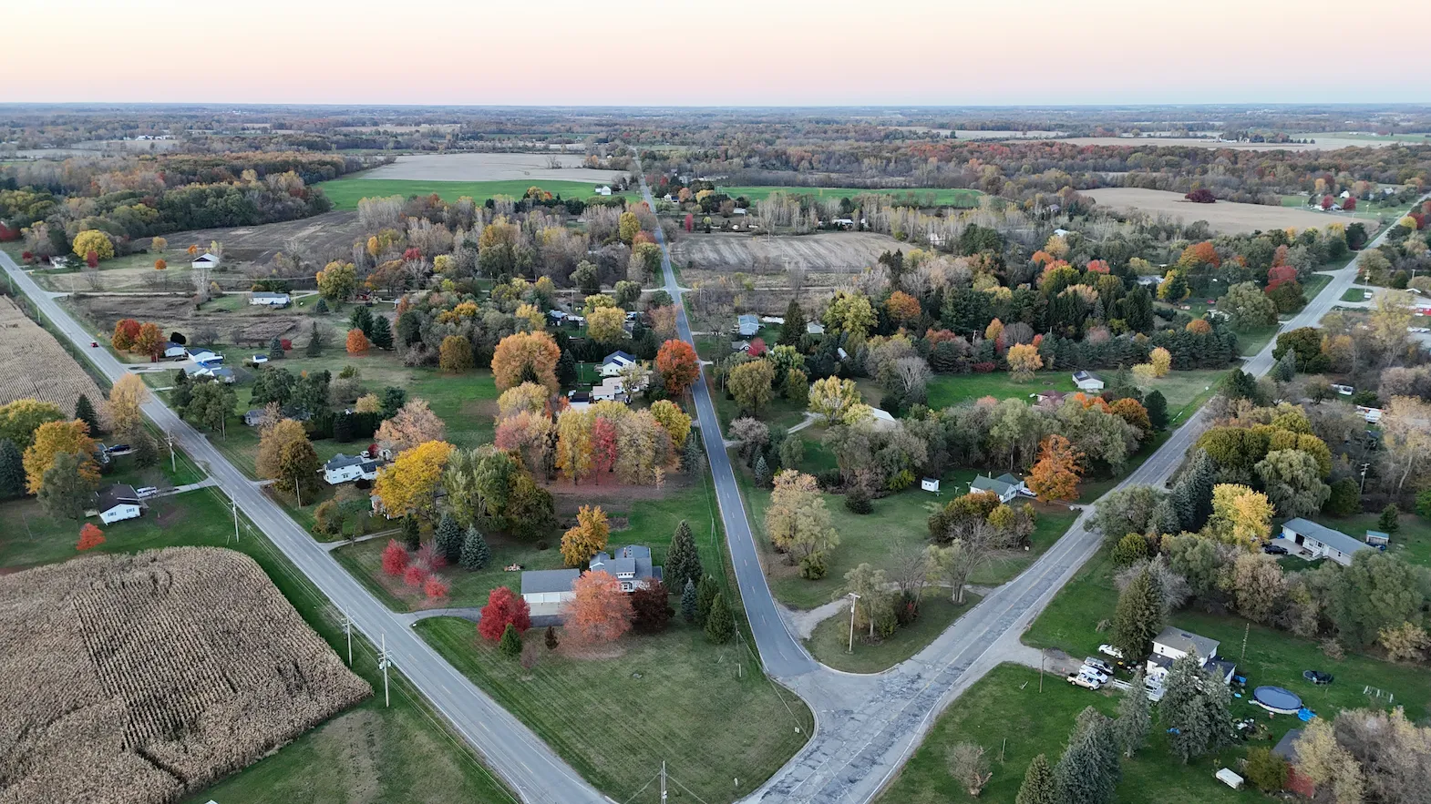Rural corridor overview — mid-Michigan, fall aerial